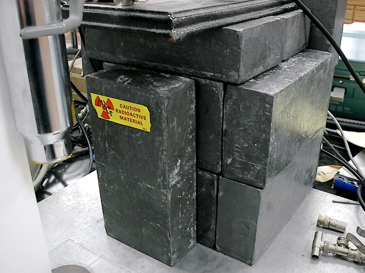 Lead bricks shielding a radioactive sample